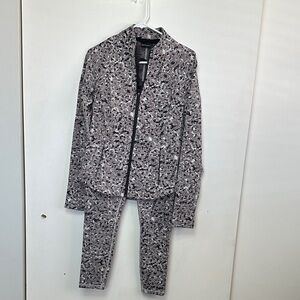 Athleta Black and Gray Patterned jacket and leggings.